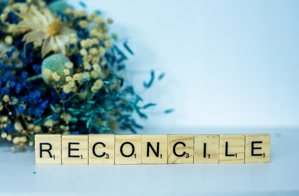 reconcile-letters-flowers-sky-blue-brown-yellow