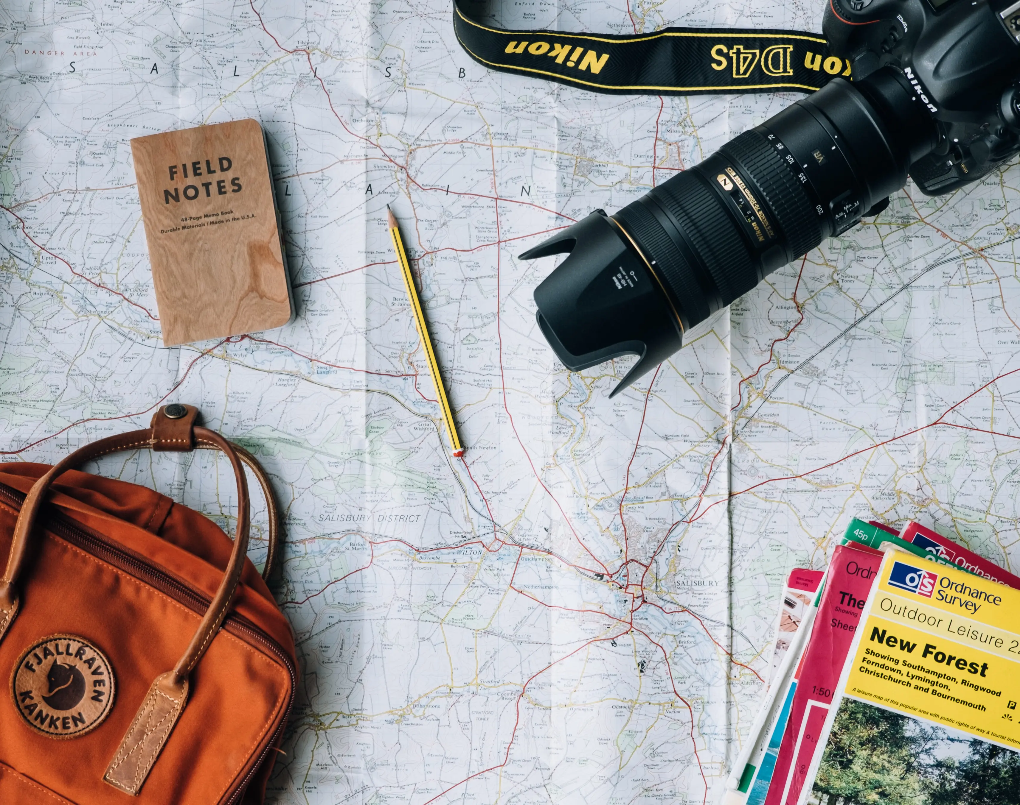 map-bag-camera-notebook-pencil-guides