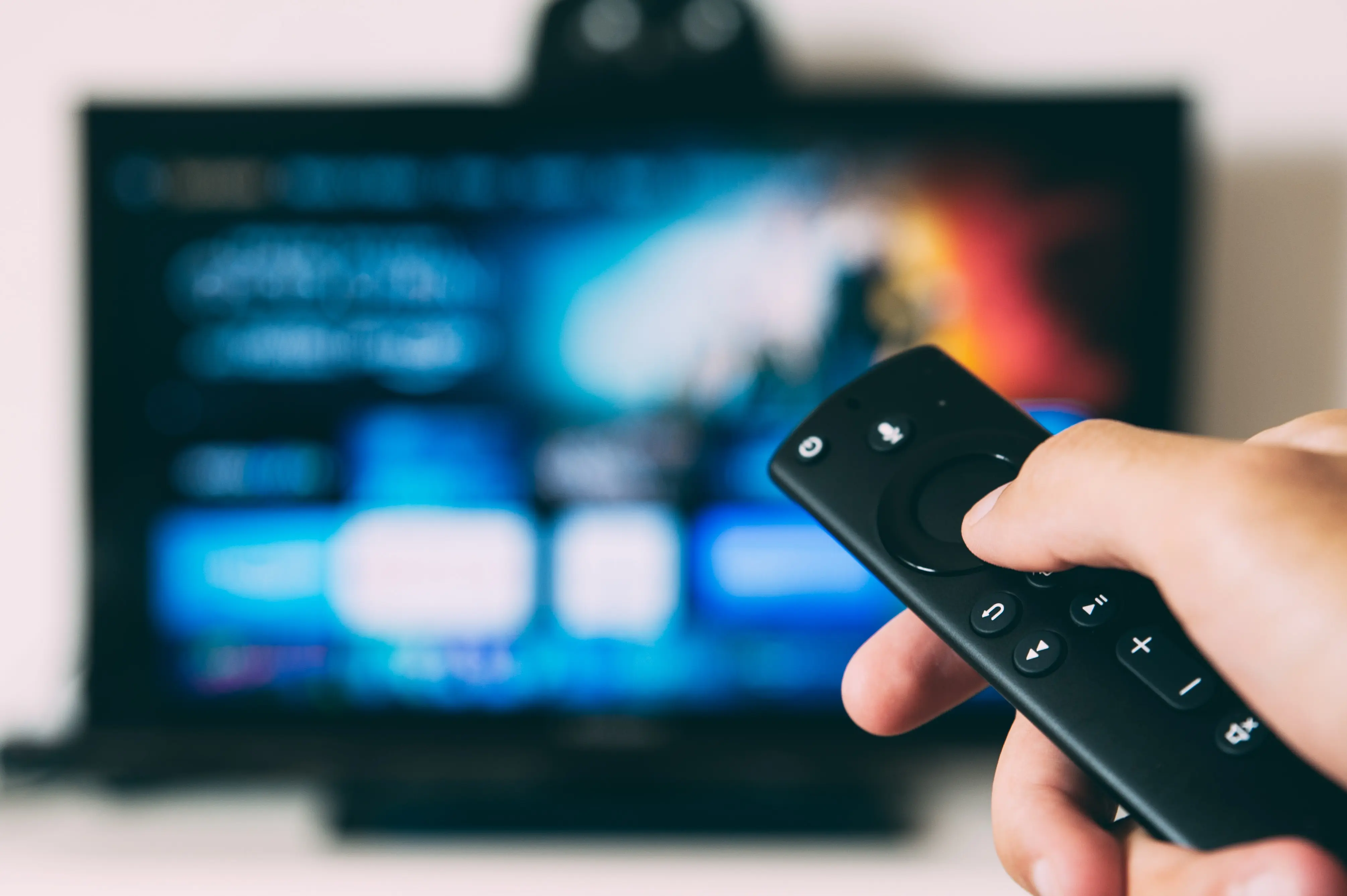 tv-screen-hand-remote-control-buttons-blue-black-white